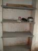 shelf in one of the ground floor kitchen